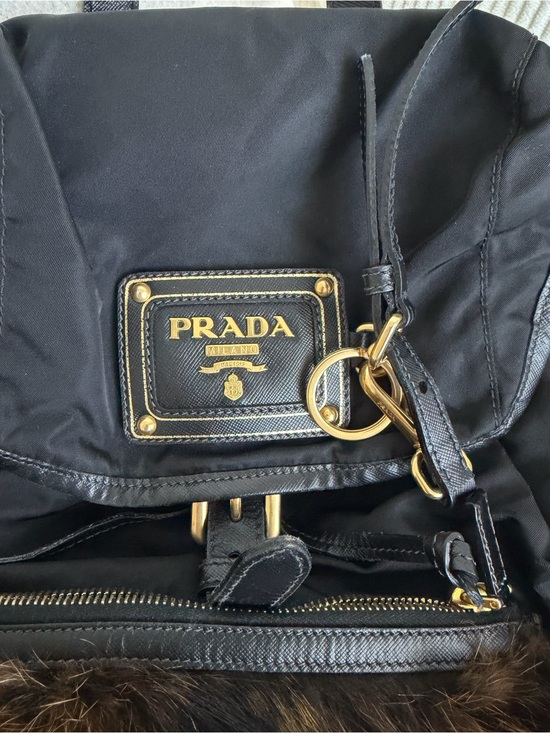 Prada Black Nylon Backpack with Brown Fur Pocket and Gold Hardware